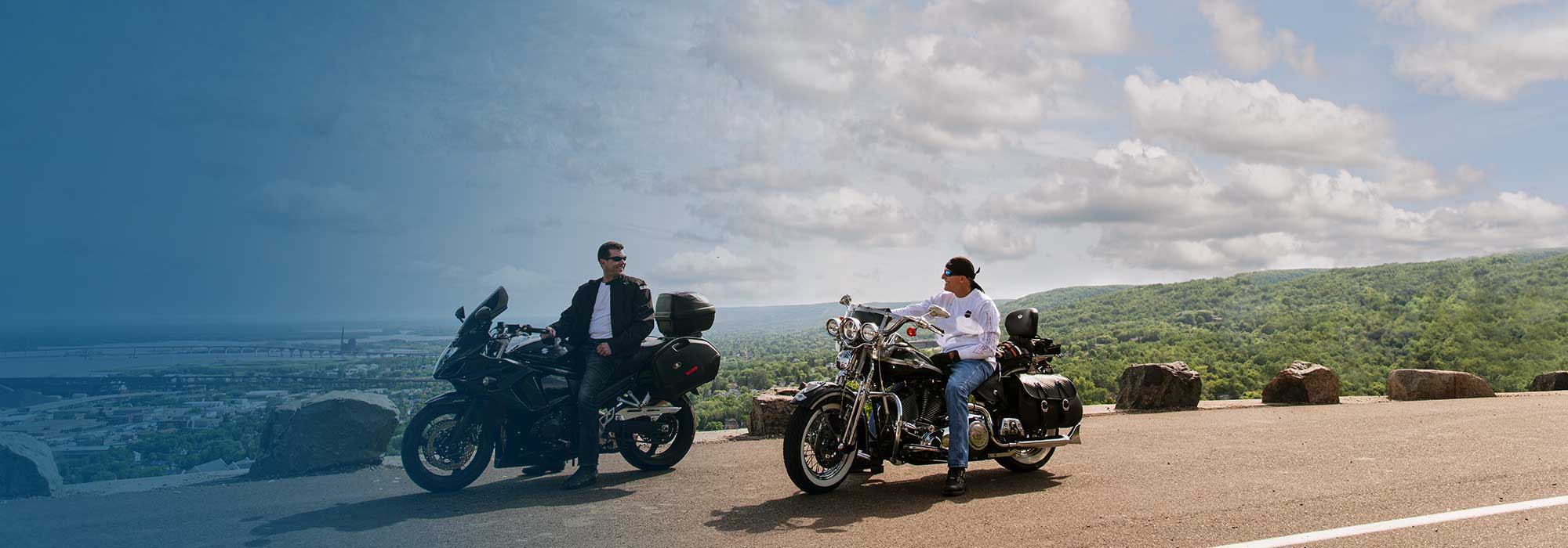 Rick and Gabe riding motorcycles